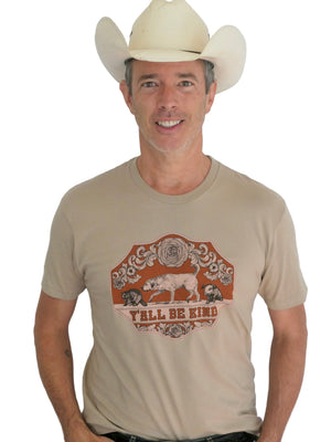 Man wearing a cowboy hat and a tan t-shirt with that says Y'all Be Kind
