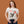 Woman wearing a Cat Wrangler Rodeo T-shirt in front of a brown background