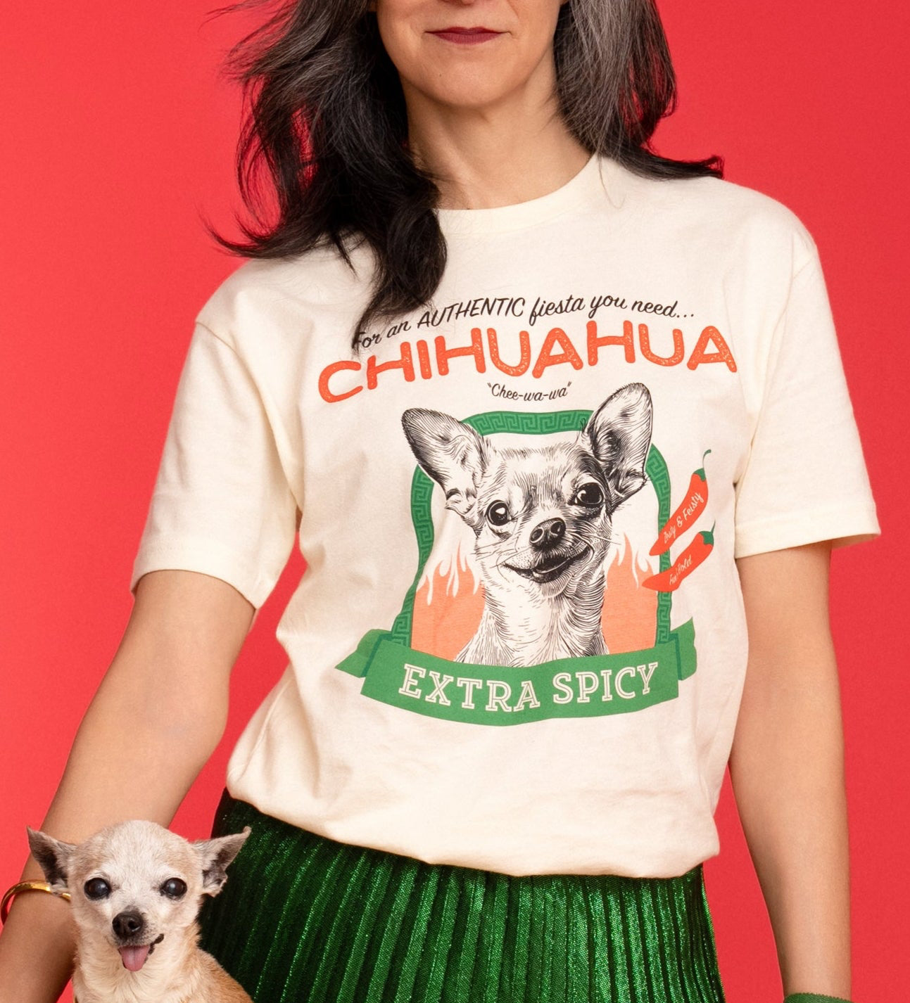 Close up view of Pet Rodeo's Spicy Chihuahua Tshirt on a woman with a small dog