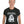 Man wearing a black t-shirt with a bulldog graphic and text