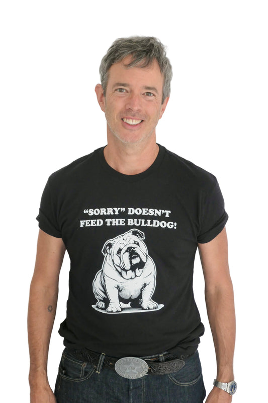 Man wearing a black t-shirt with a bulldog graphic and text