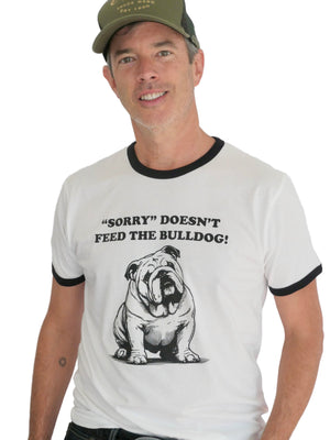 Man wearing a white t-shirt with a bulldog graphic and text