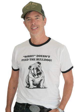 Man wearing a white t-shirt with a bulldog graphic and text