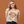A woman wearing Pet Rodeo's vintage western graphic tshirt that says Y'all Be Kind