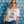 Woman wearing Pet Rodeo's Sorry Bulldog Tshirt with a yellow bandana