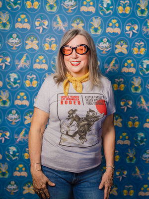 Woman wearing Pet Rodeo's Cat Wrangler Rodeo Tshirt for women