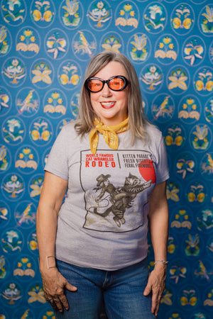 Woman wearing Pet Rodeo's Cat Wrangler Rodeo Tshirt for women