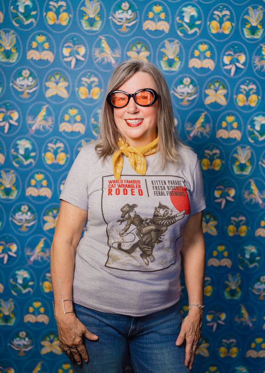 Woman wearing Pet Rodeo's Cat Wrangler Rodeo Tshirt for women